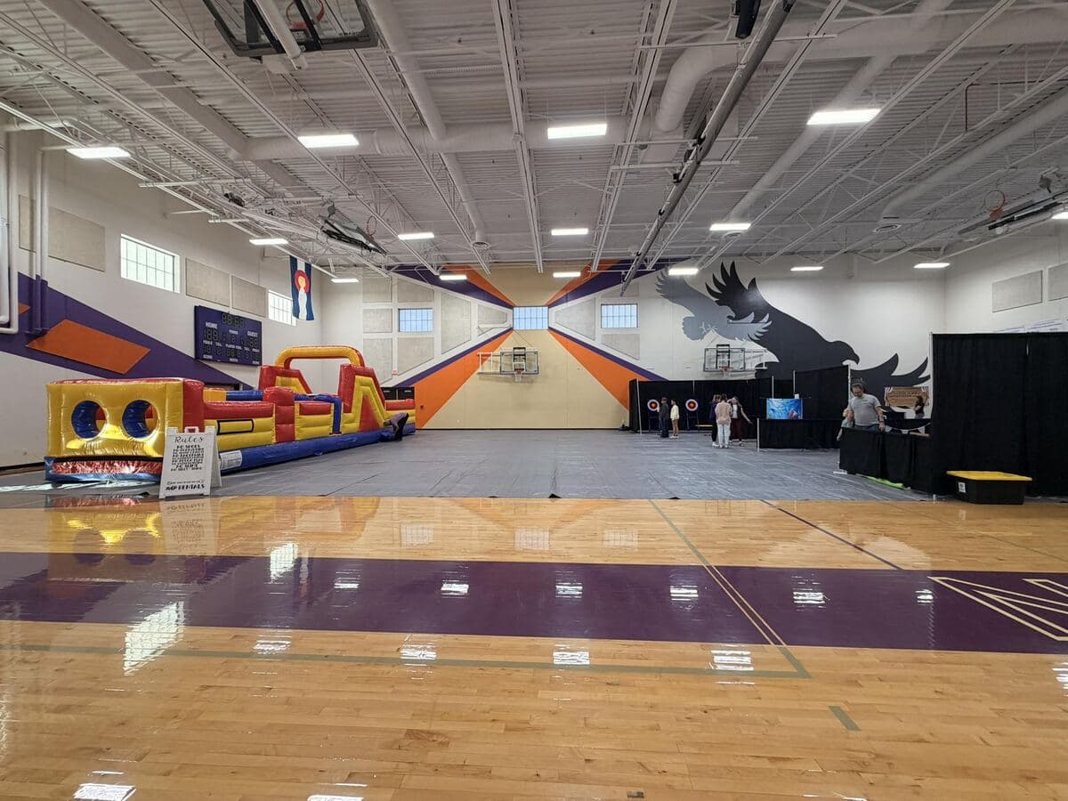Inflatable obstacle course set up in a gym